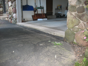 Sunken Asphalt Driveway Repair